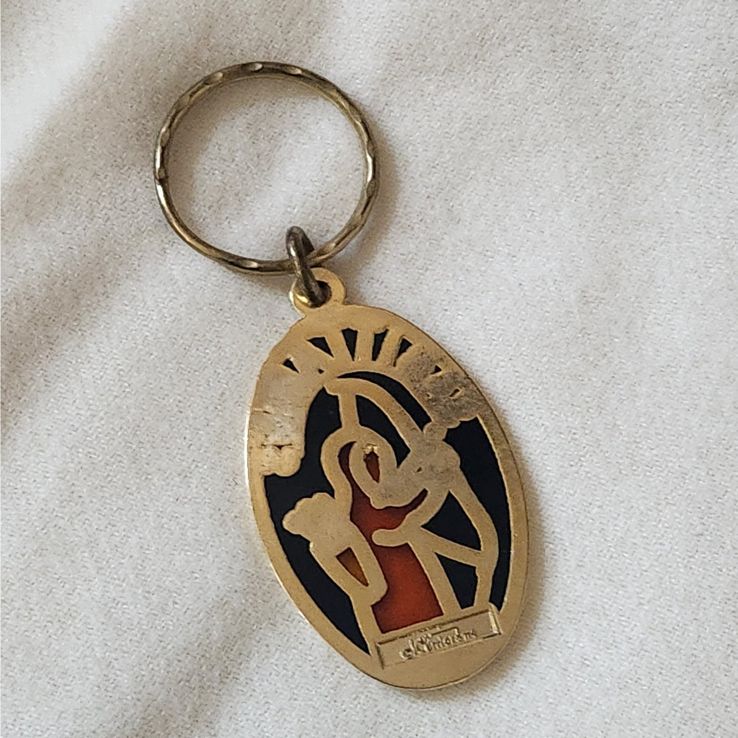 1970s  Enamel and Brass Sagittarius Key Ring