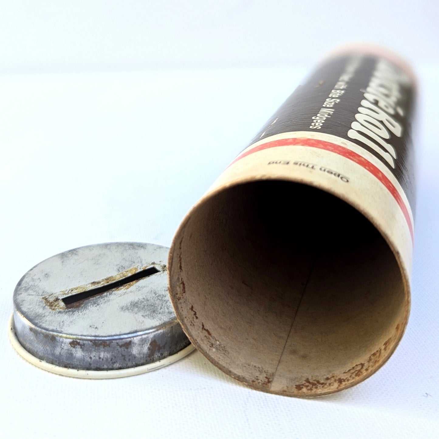 Vintage 1970s Tootsie Roll Coin Bank – 7.5” Tall Retro Candy Tube Reusable Promotional Bank – Iconic Chocolate Candy Branding – Collectible Kids Home Gift