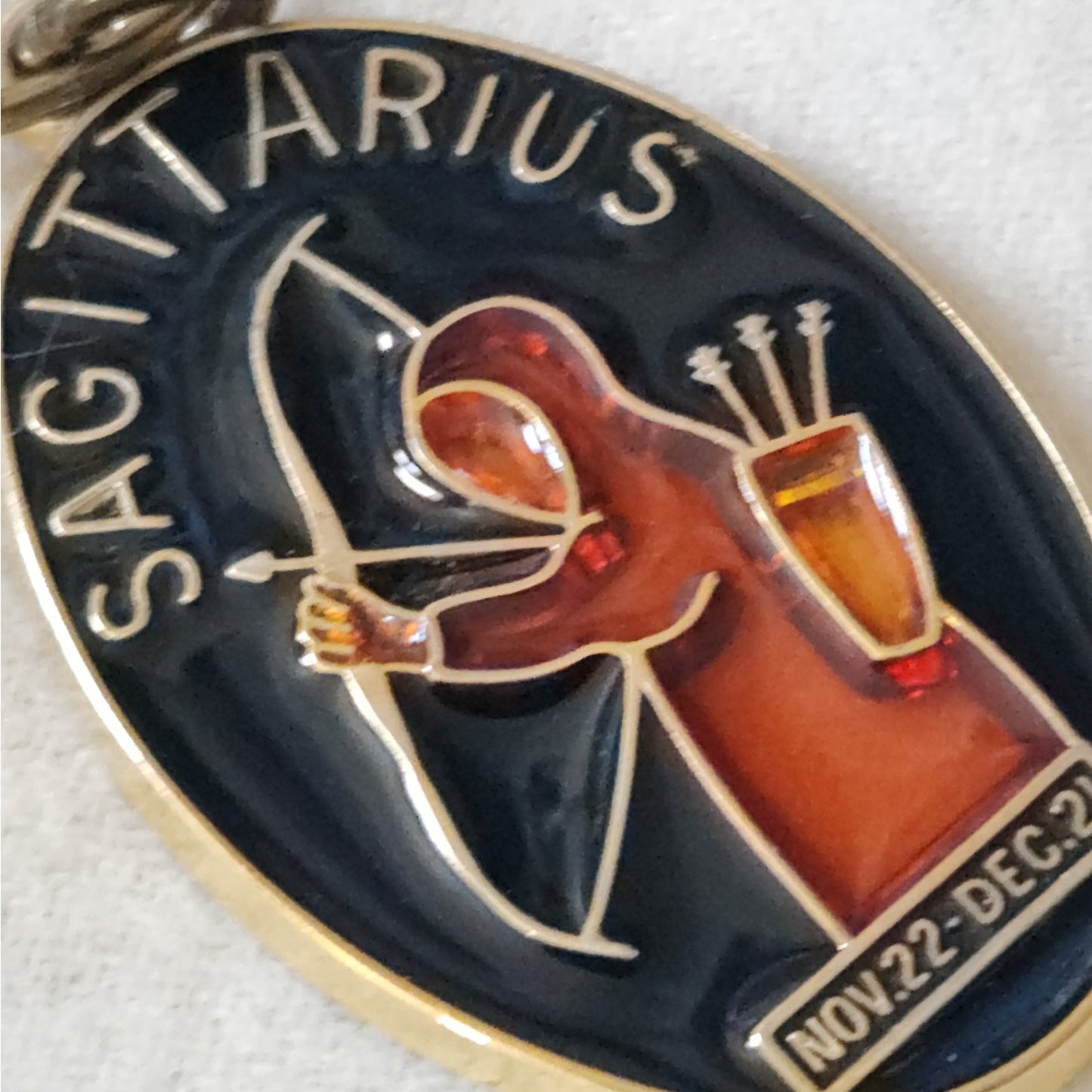 1970s  Enamel and Brass Sagittarius Key Ring