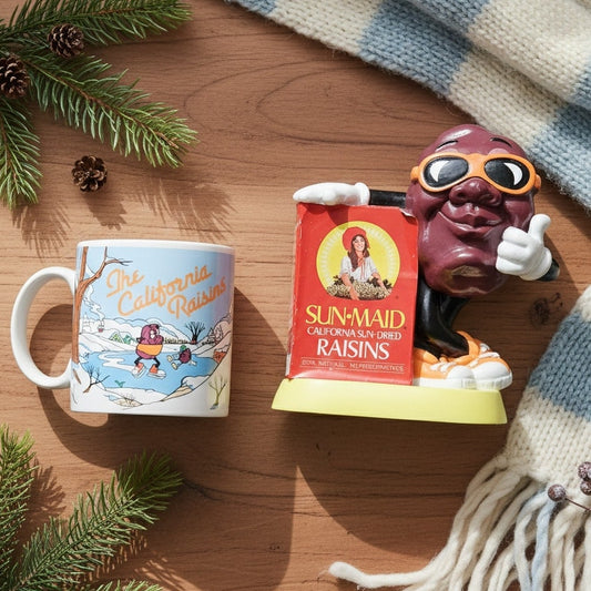 Vintage California Raisins Gift Bundle – 1988 Winter Mug + 1987 Sun-Maid Raisin Piggy Bank | Retro Kitchen Decor | 80s Nostalgia Collectible Set