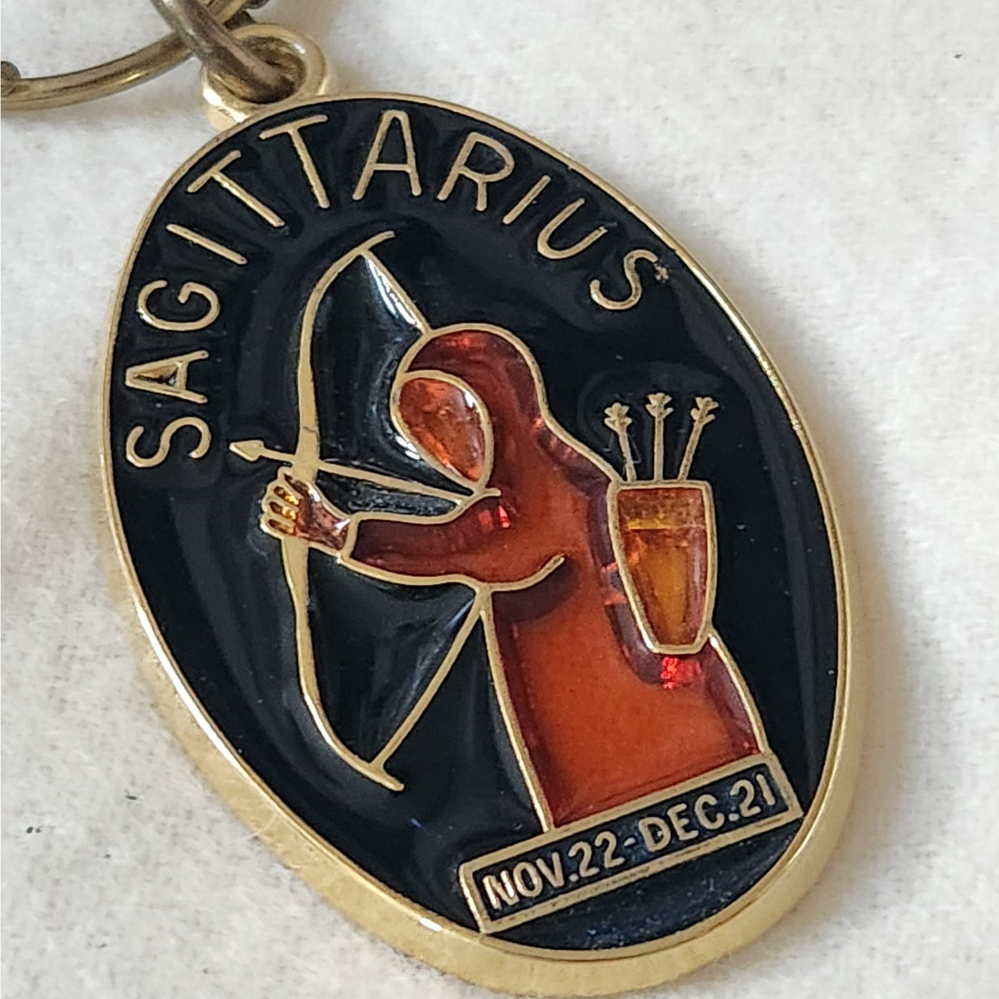 1970s  Enamel and Brass Sagittarius Key Ring