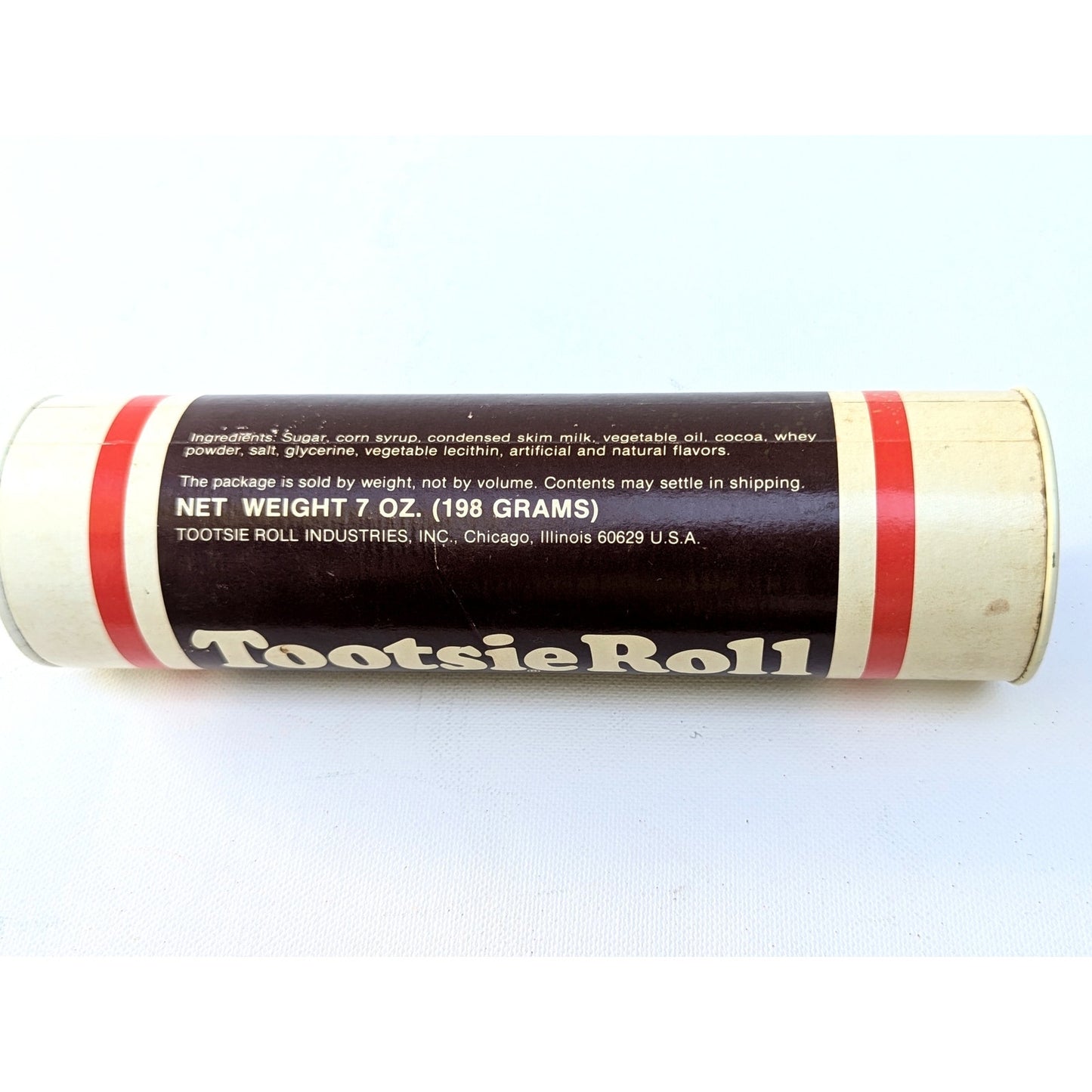 Vintage 1970s Tootsie Roll Coin Bank – 7.5” Tall Retro Candy Tube Reusable Promotional Bank – Iconic Chocolate Candy Branding – Collectible Kids Home Gift