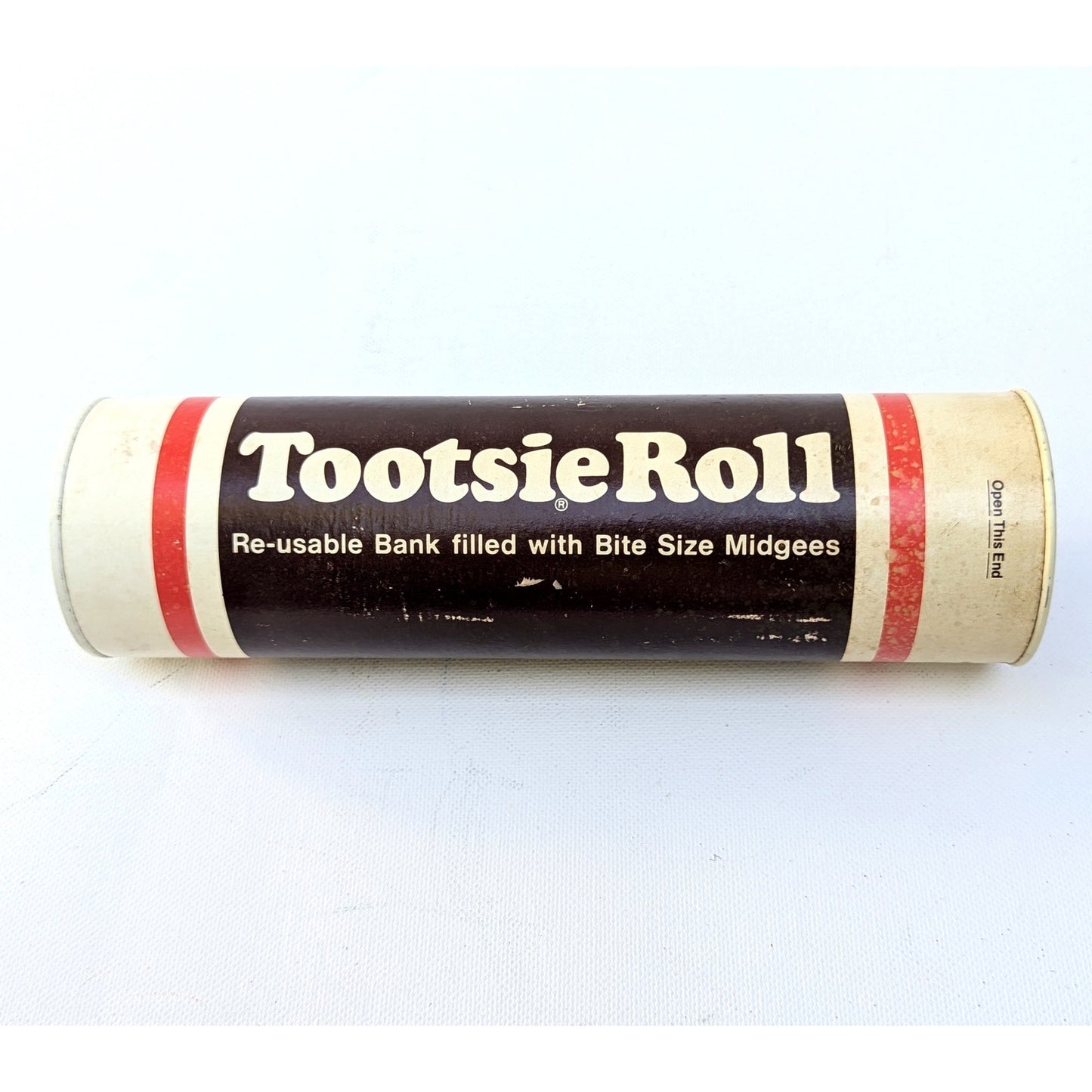 Vintage 1970s Tootsie Roll Coin Bank – 7.5” Tall Retro Candy Tube Reusable Promotional Bank – Iconic Chocolate Candy Branding – Collectible Kids Home Gift
